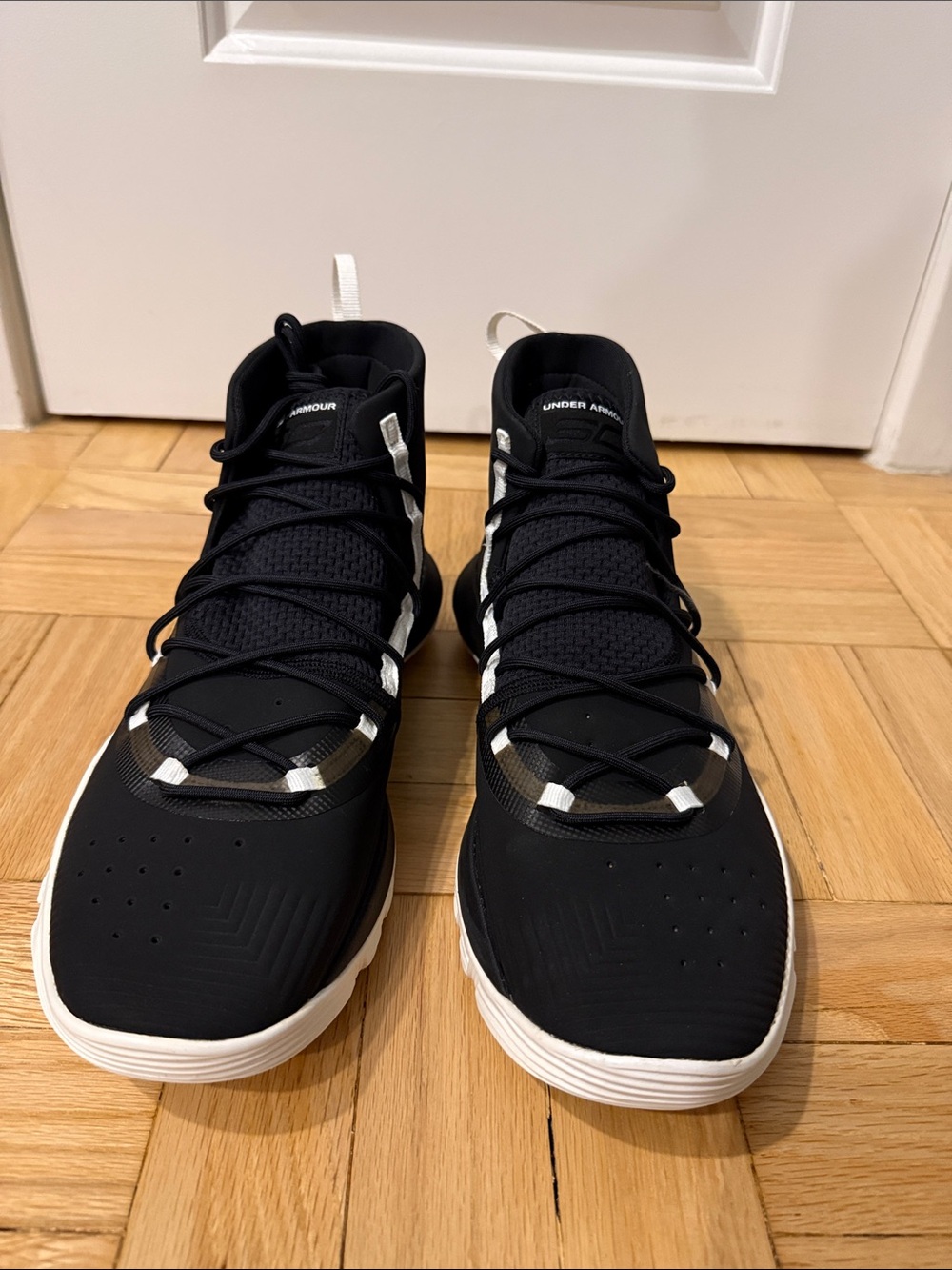 Under Armour Steph Curry Black and White High-Top Basketball Sneakers